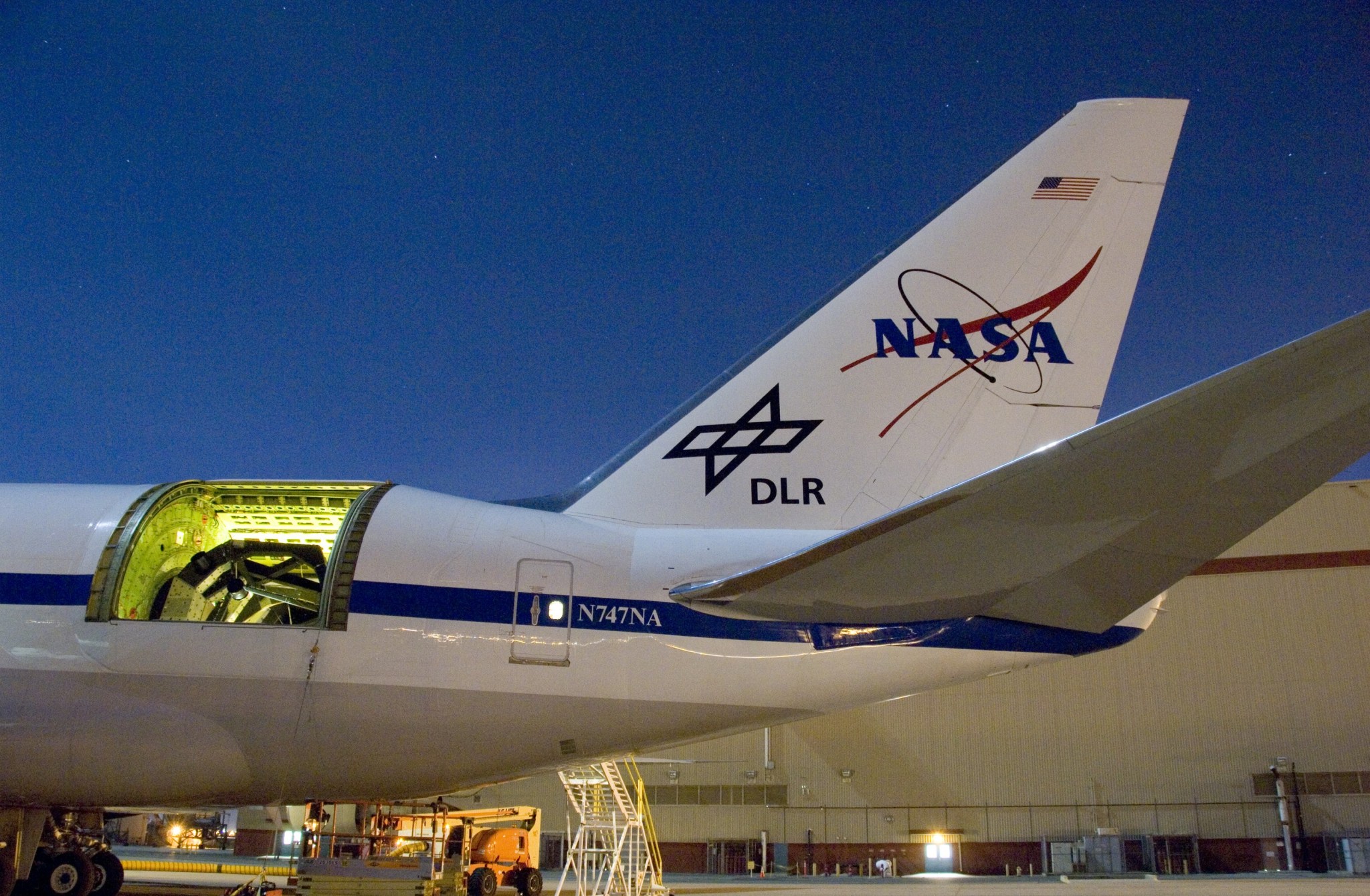 The tail of NASA reserach aircraft with the rear door open.