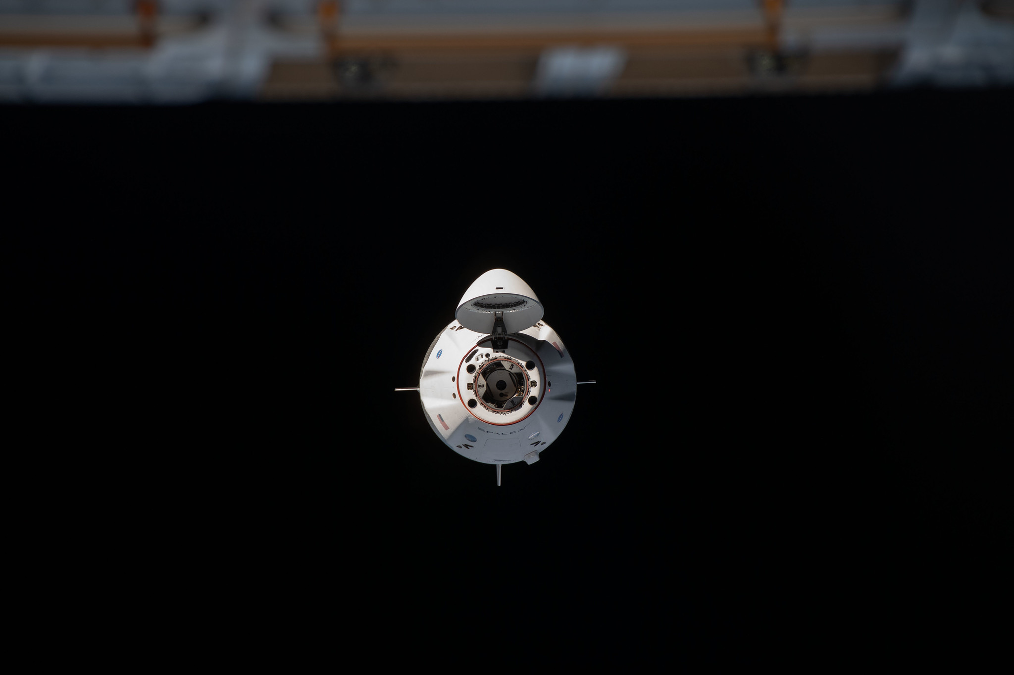 The SpaceX Crew Dragon spacecraft is pictured approaching the International Space Station for a docking