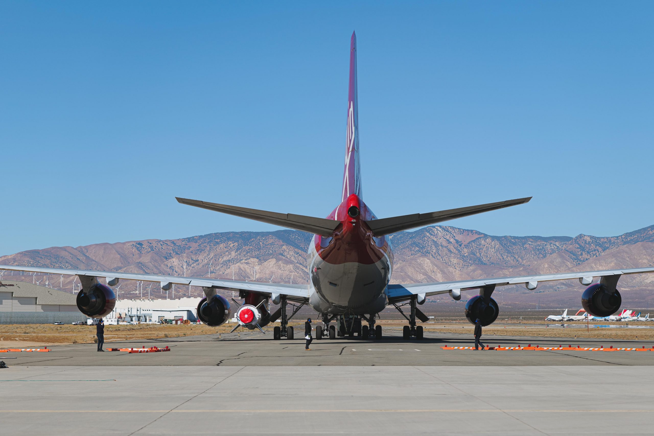 Ahead of the company’s Launch Demo 2 mission, Virgin Orbit’s carrier aircraft Cosmic Girl is staged on a taxiway with LauncherOne underwing at Mojave Air and Spaceport in California. November 10, 2020.