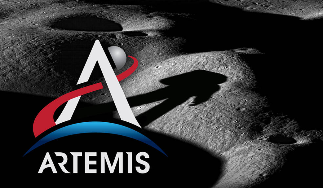 Artemis logo beams a shadow of an astronaut onto the lunar surface