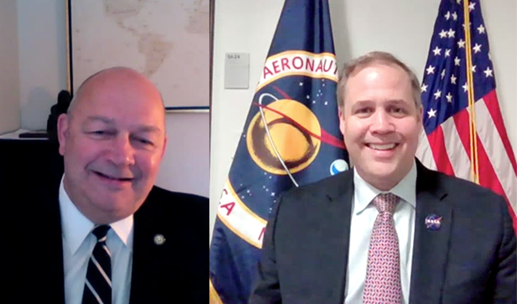 NASA Administrator Jim Bridenstine, right, and FAA Administrator Steve Dickson pose for a photograph during a ceremony