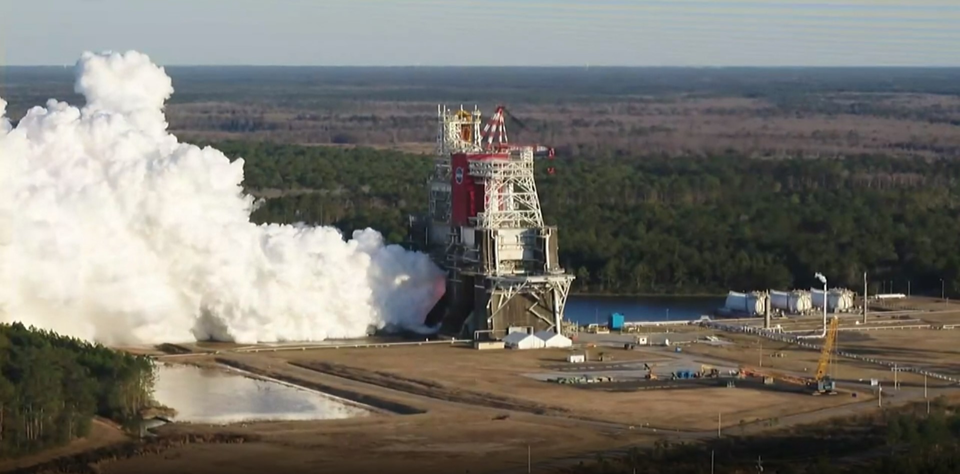 The core stage for the first flight of NASA’s Space Launch System rocket is seen in the B-2 Test Stand during a hot fire test