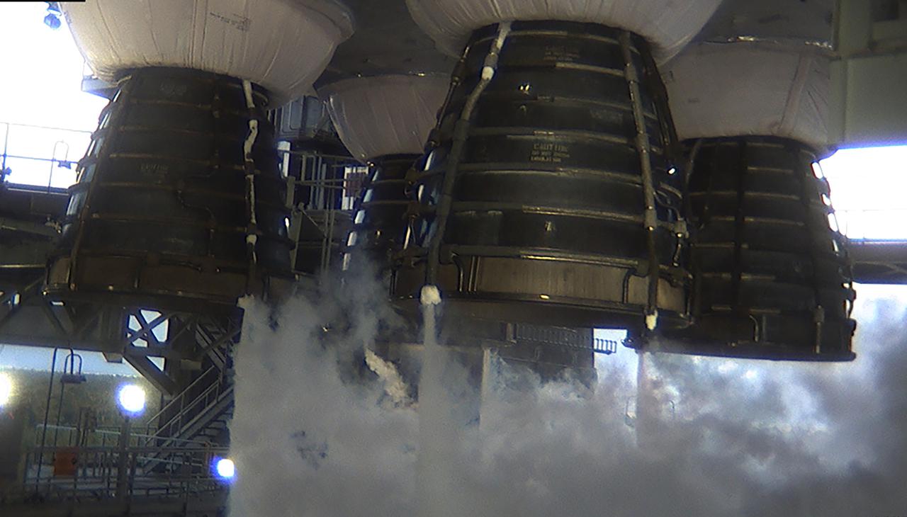 This image shows liquid oxygen as it naturally boils off and is vented from the four RS-25 engines