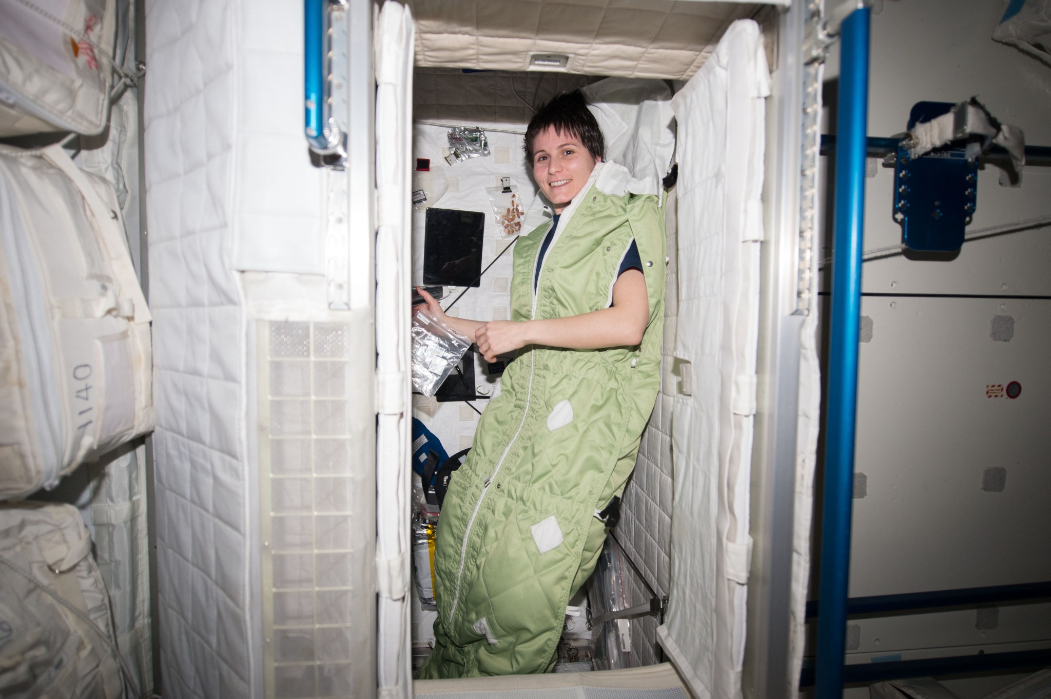 astronaut Samantha Cristoforetti inside sleeping quarters