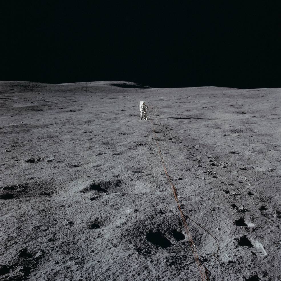 apollo_14_eva1_mitchell_at_end_of_geophpone_line