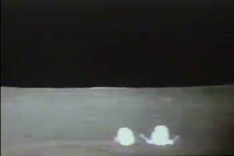 apollo_14_eva1_shepard_and_mitchell_at_alsep_setup_location_from_tv