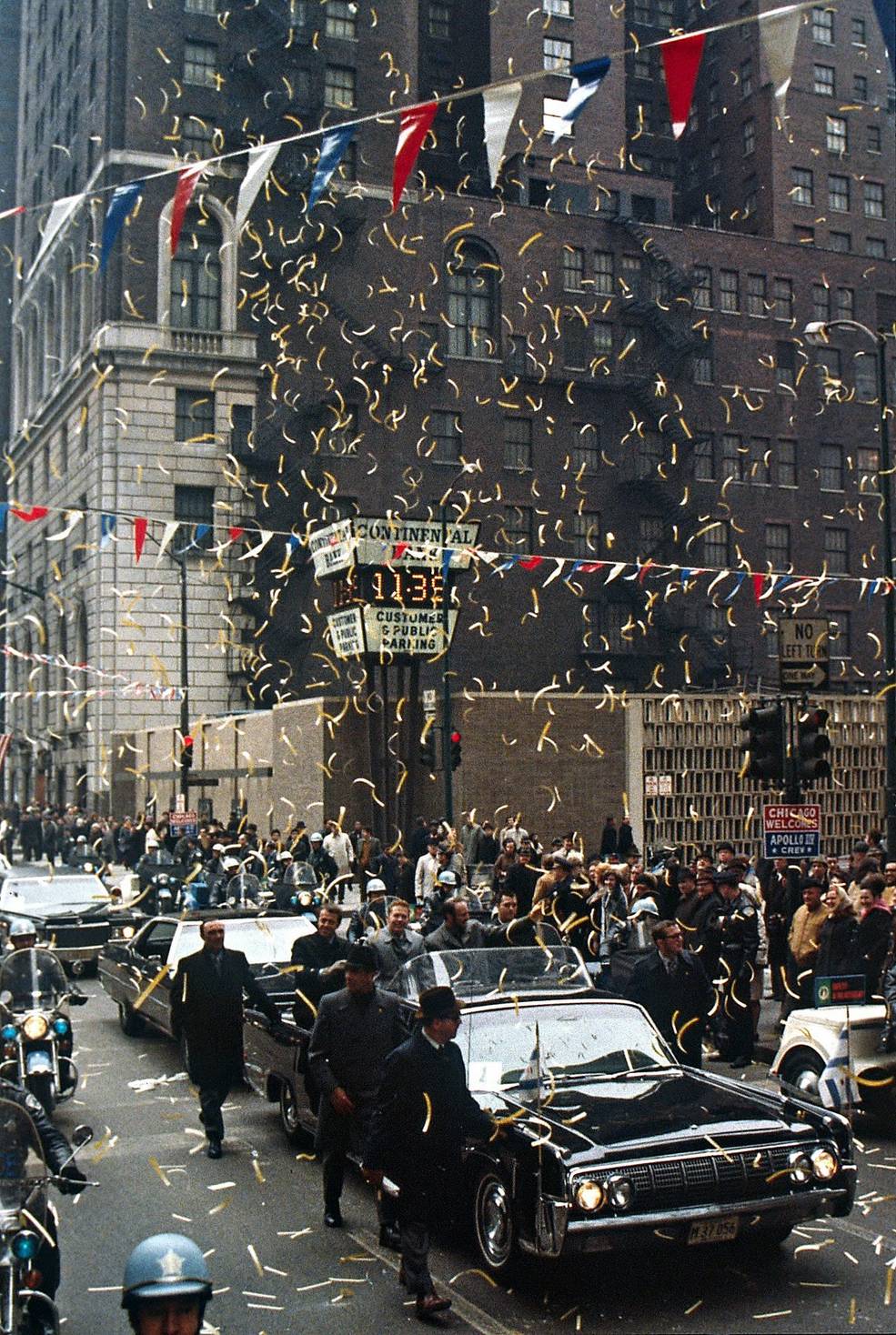 Apollo 14 astronauts Shepard, left, Roosa, and Mitchell riding in a motorcade in Chicago