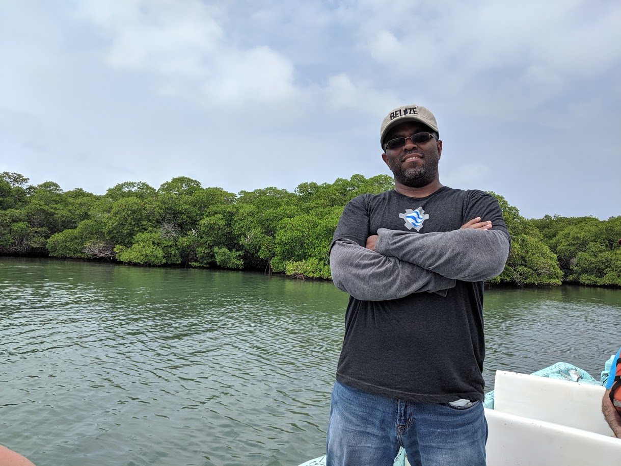 Emil Cherrington in 2019 in front of the Belize mangrove ecosystems he usually studies from space. 