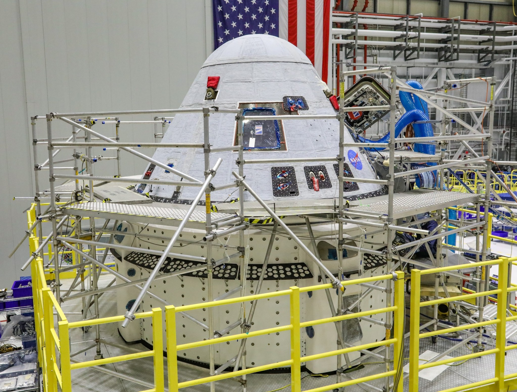 Boeing's Orbital Flight Test-2 Starliner is pictured in the Commercial Crew and Cargo Processing Facility