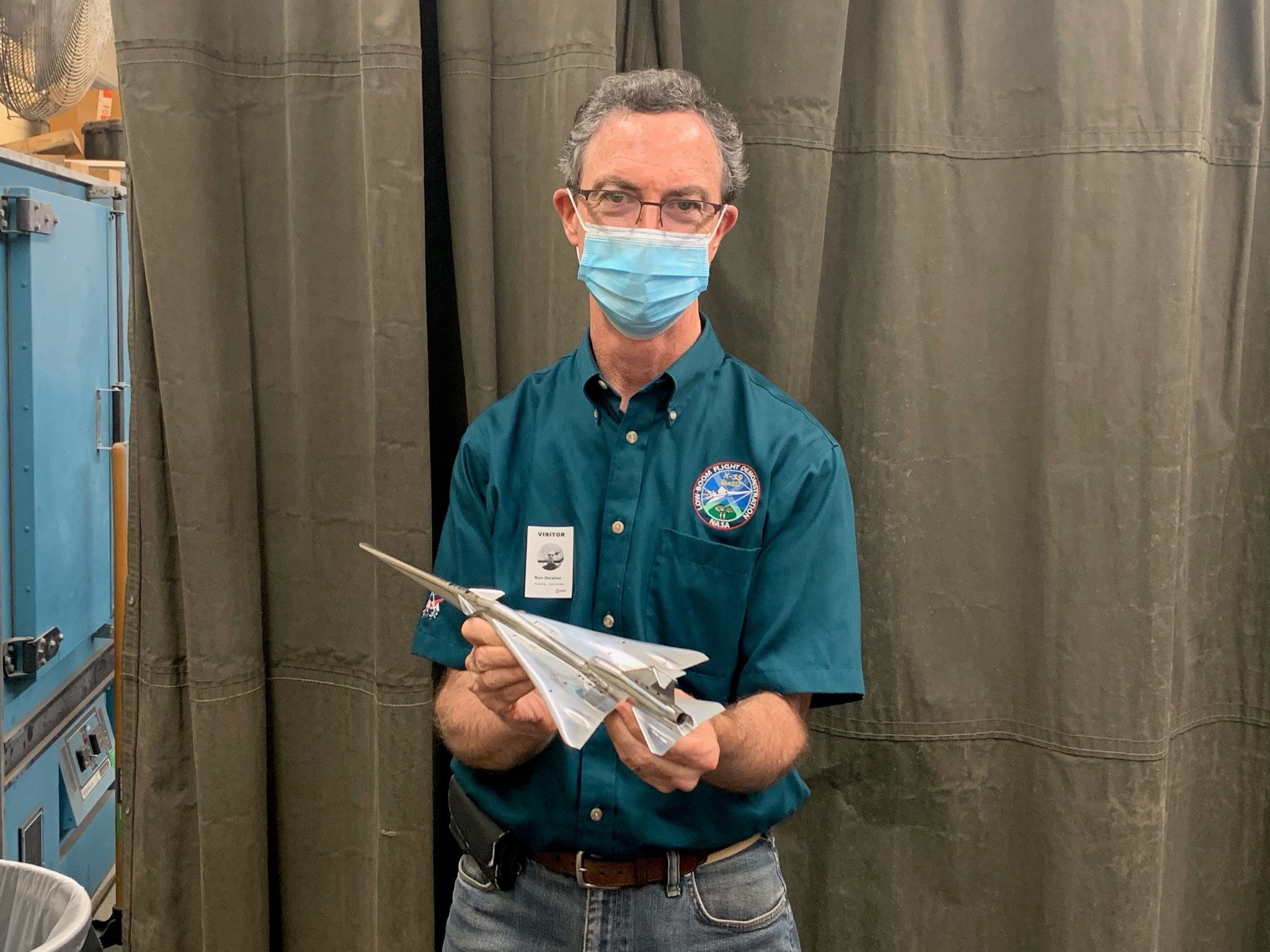 NASA researcher Don Durston presents the scale model of the X-59 Quiet SuperSonic Technology airplane.