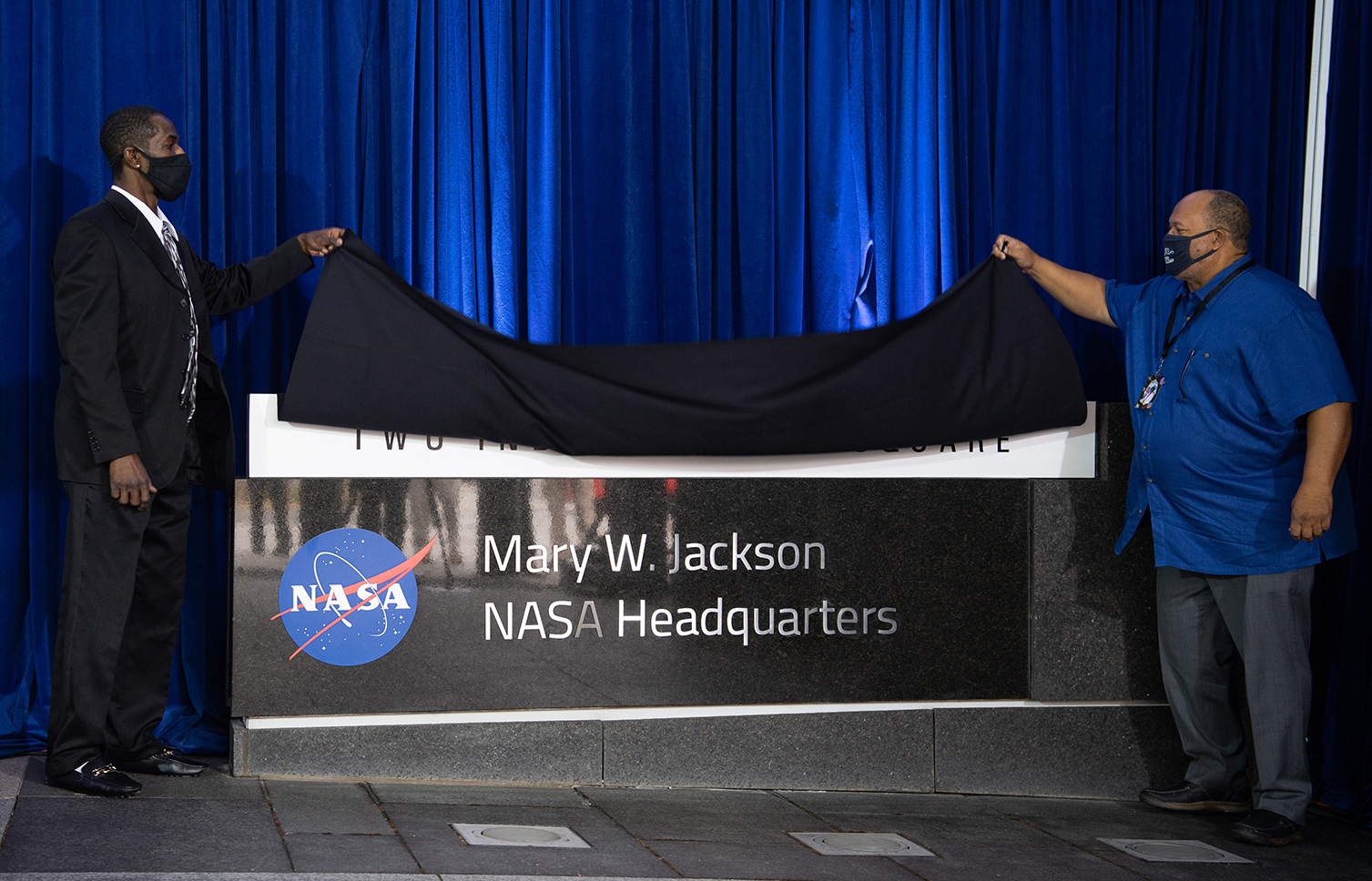 Mary Jackson's grandsons unveil the plague naming the NASA HQ building for her.