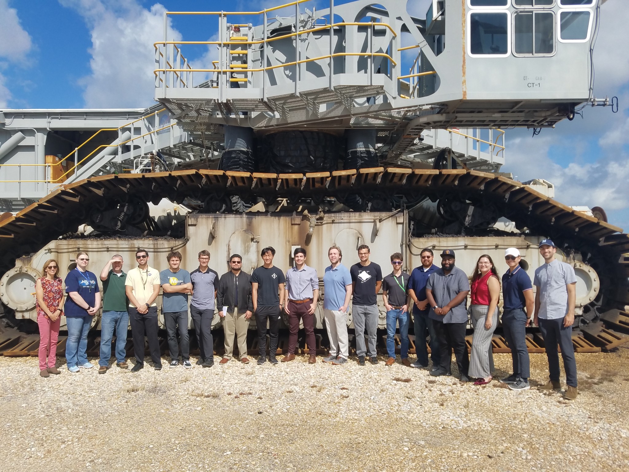 Interns at NASA's Kennedy Space Center in Florida tour the crawler-transporter.
