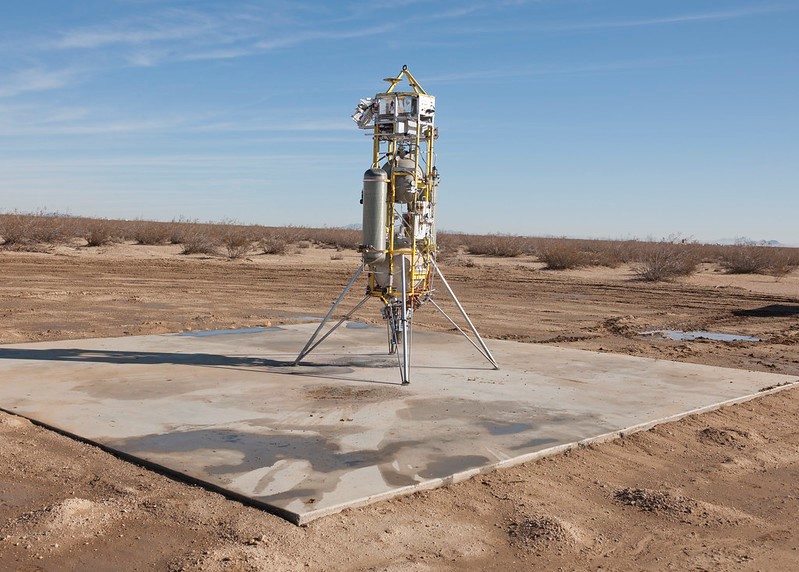 Masten’s Xombie VTVL system sits on a launchpad in Mojave.