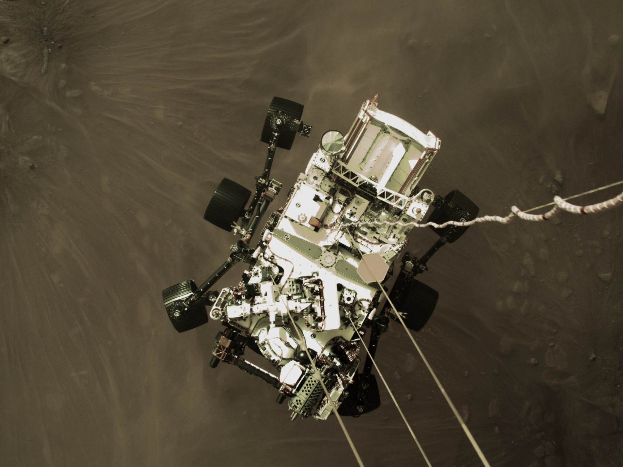 photo of the Mars Perseverance Rover descending from its skycrane