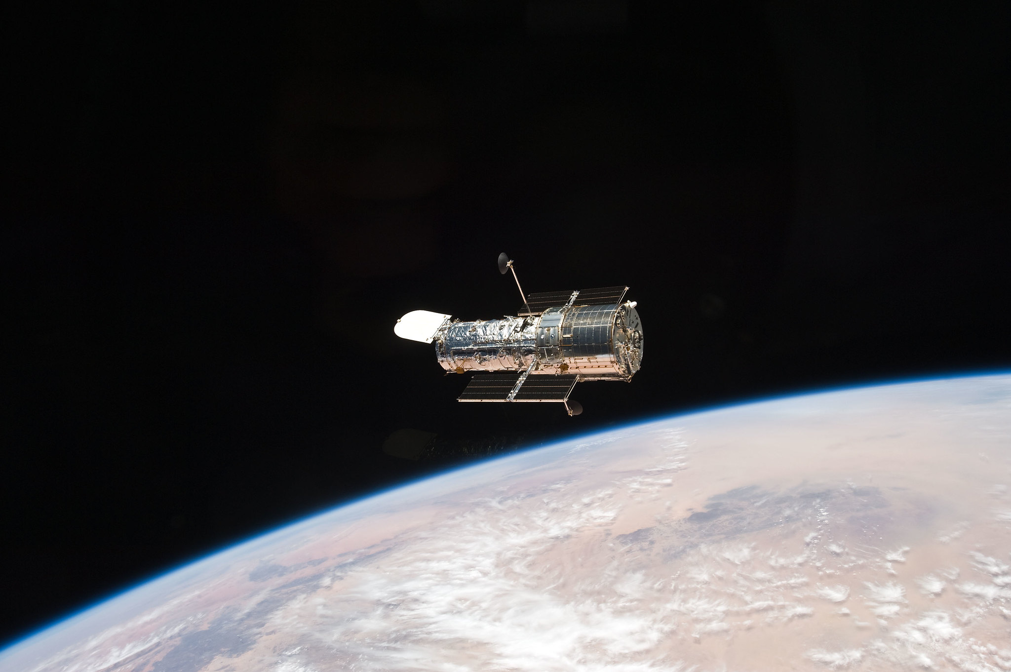 Hubble Space Telescope floating in space.