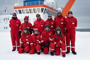 The 2021 overwintering team in front of Polarstern upon arrival in Antarctica.