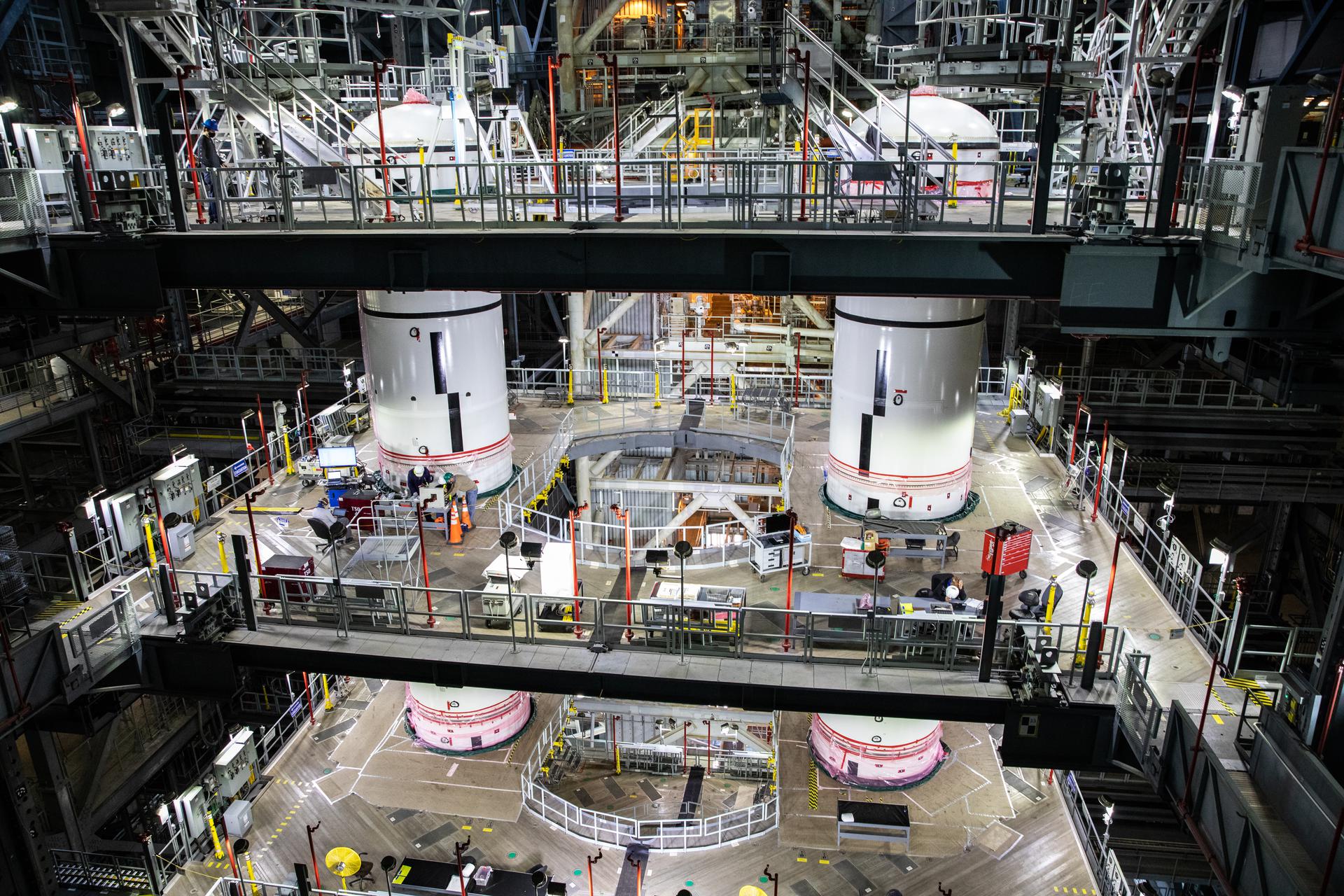 Space Launch System boosters for the Artemis I mission are stacked in the Vehicle Assembly Building.
