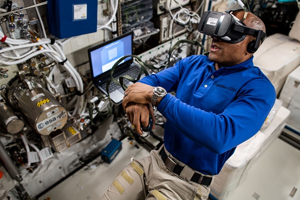 image of astronaut working on experiment