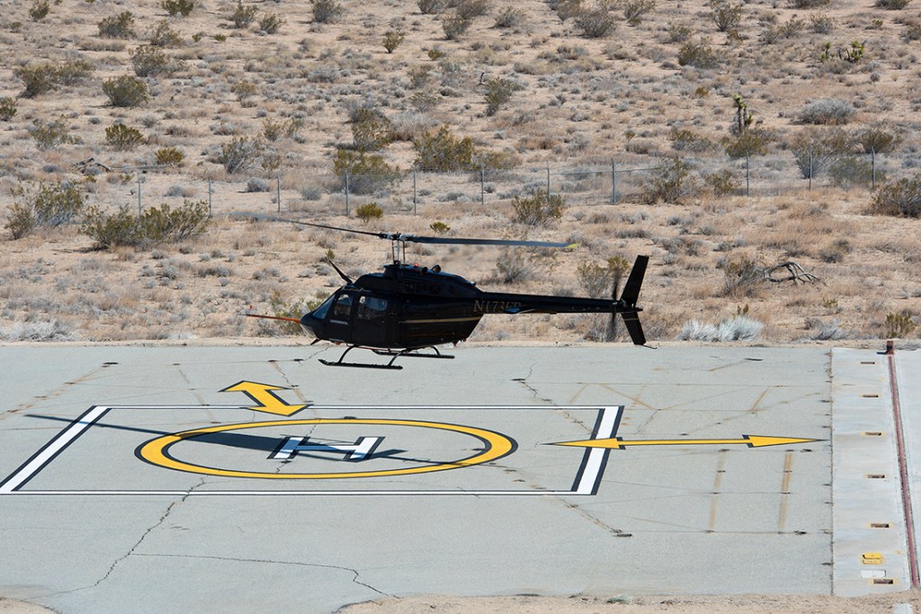 Flight Research Inc.?s Bell OH-58C Kiowa helicopter takes off
