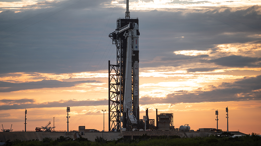 The SpaceX Falcon 9 rocket with the Crew Dragon Endeavour atop stands at the launch pad at Kennedy Space Center in Florida.