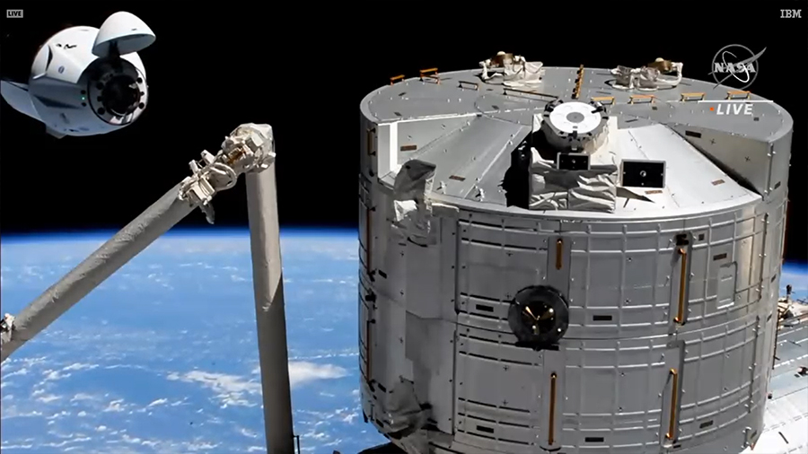 The SpaceX Crew Dragon approaches its space station docking port with the Kibo laboratory module in the foreground. Credit: NASA TV