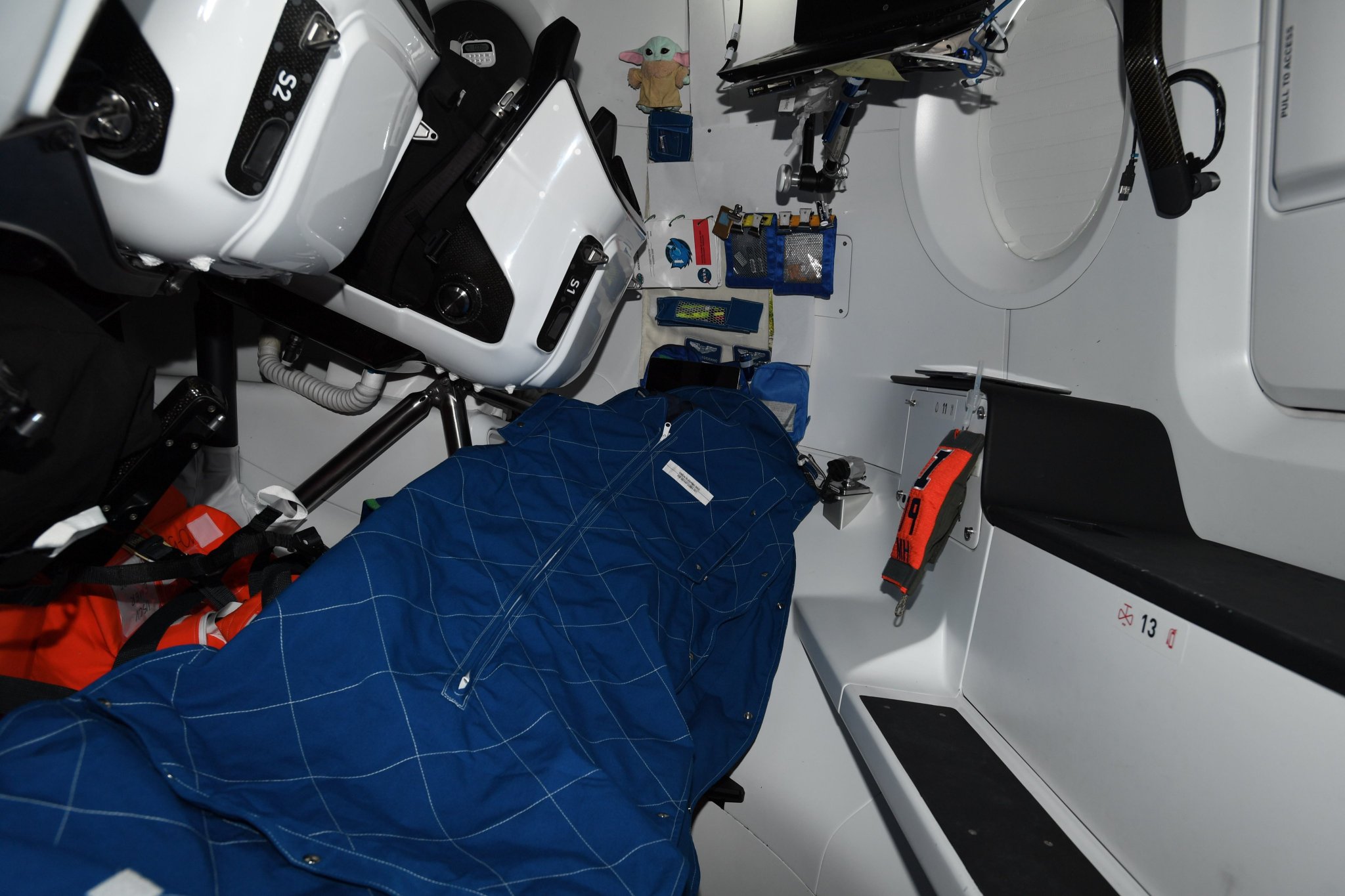 Crew sleeping space aboard the Crew Dragon Resilience spacecraft, docked to the International Space Station.