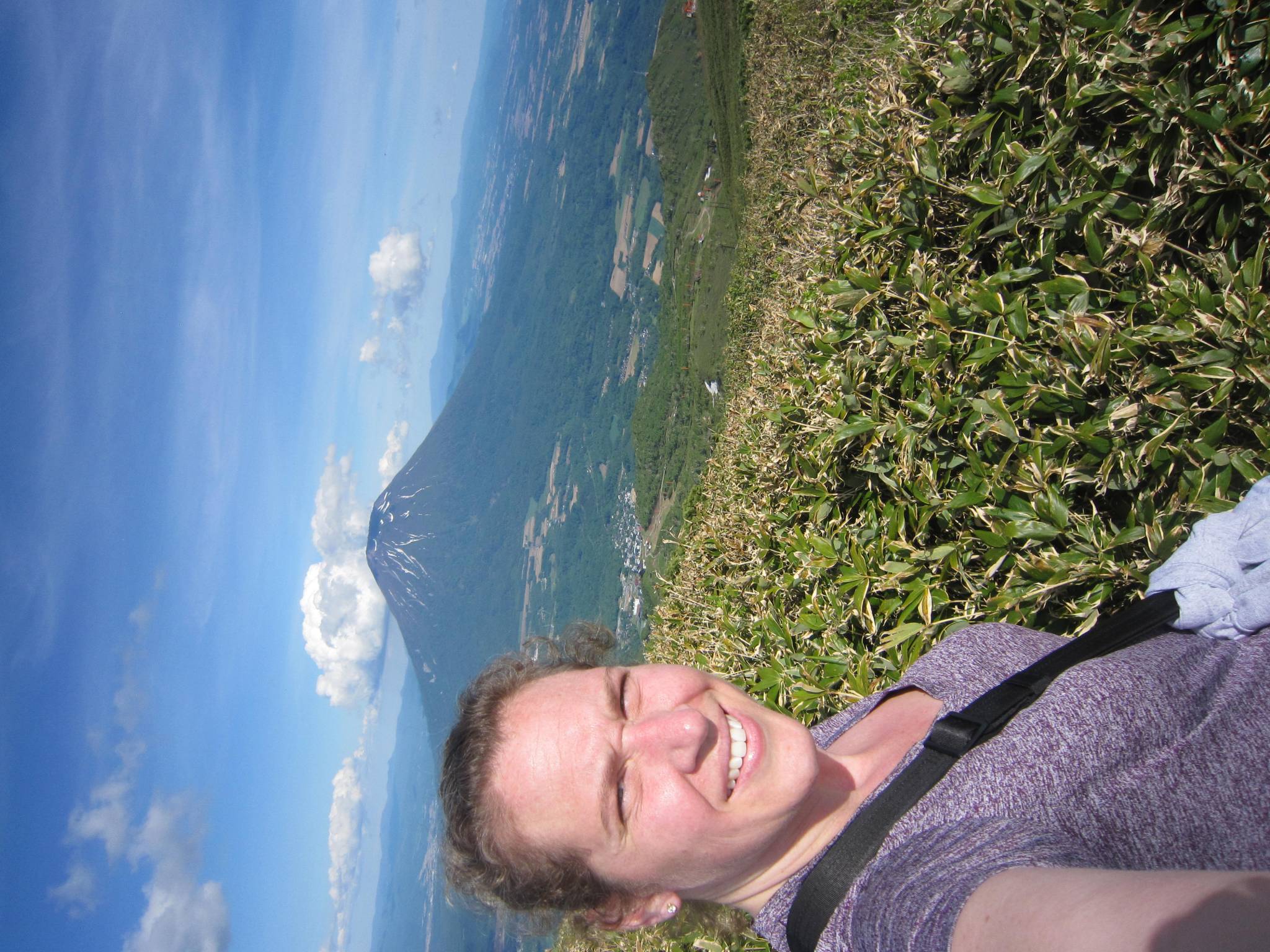 On top of Mt. Annupuri in Hokkaido, Japan looking at Mount Yotei, which is known for its resemblance to Mt. Fuji; June 2019