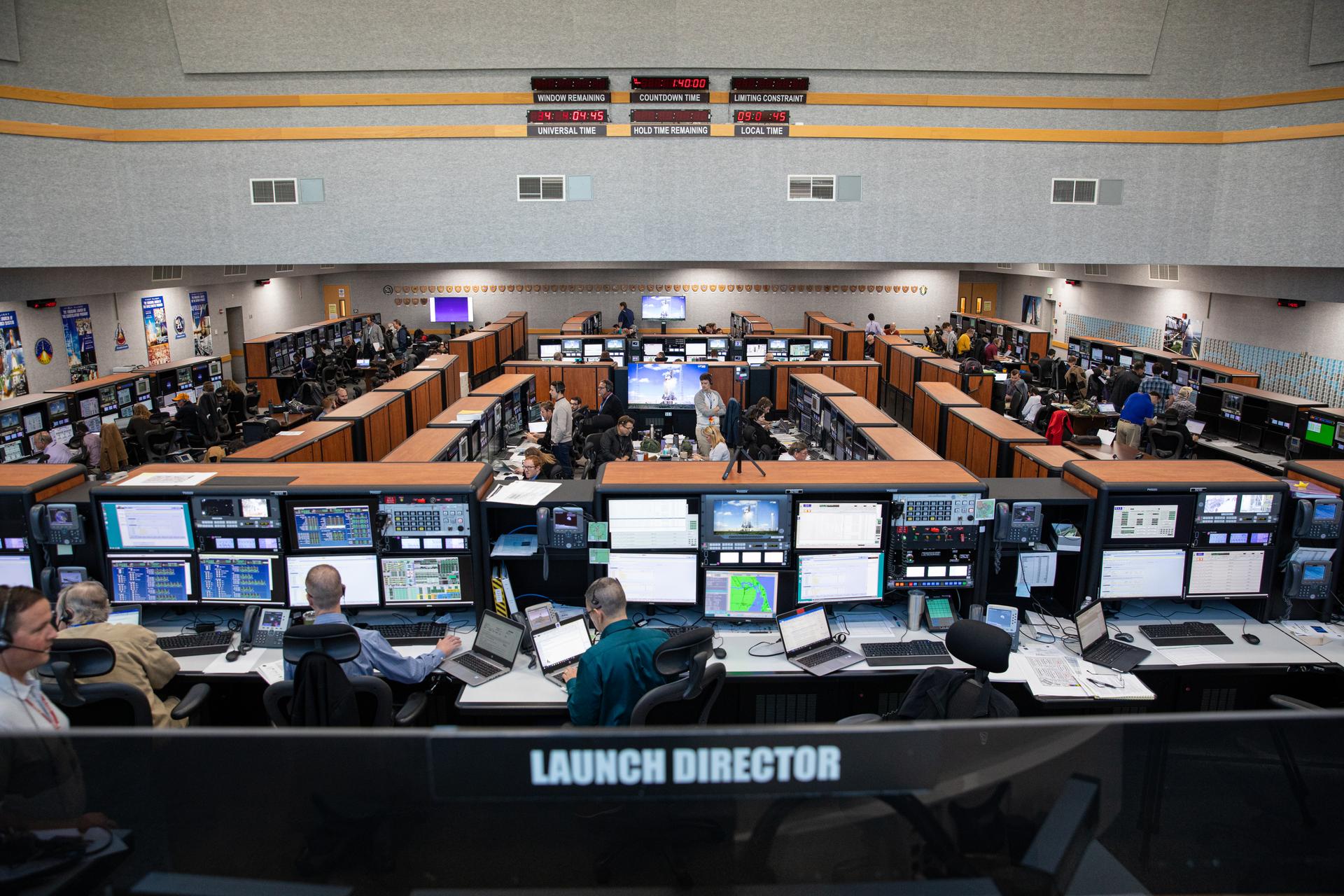 Members of the Artemis I launch team participate in a countdown simulation inside the Launch Control Center’s Firing Room 1