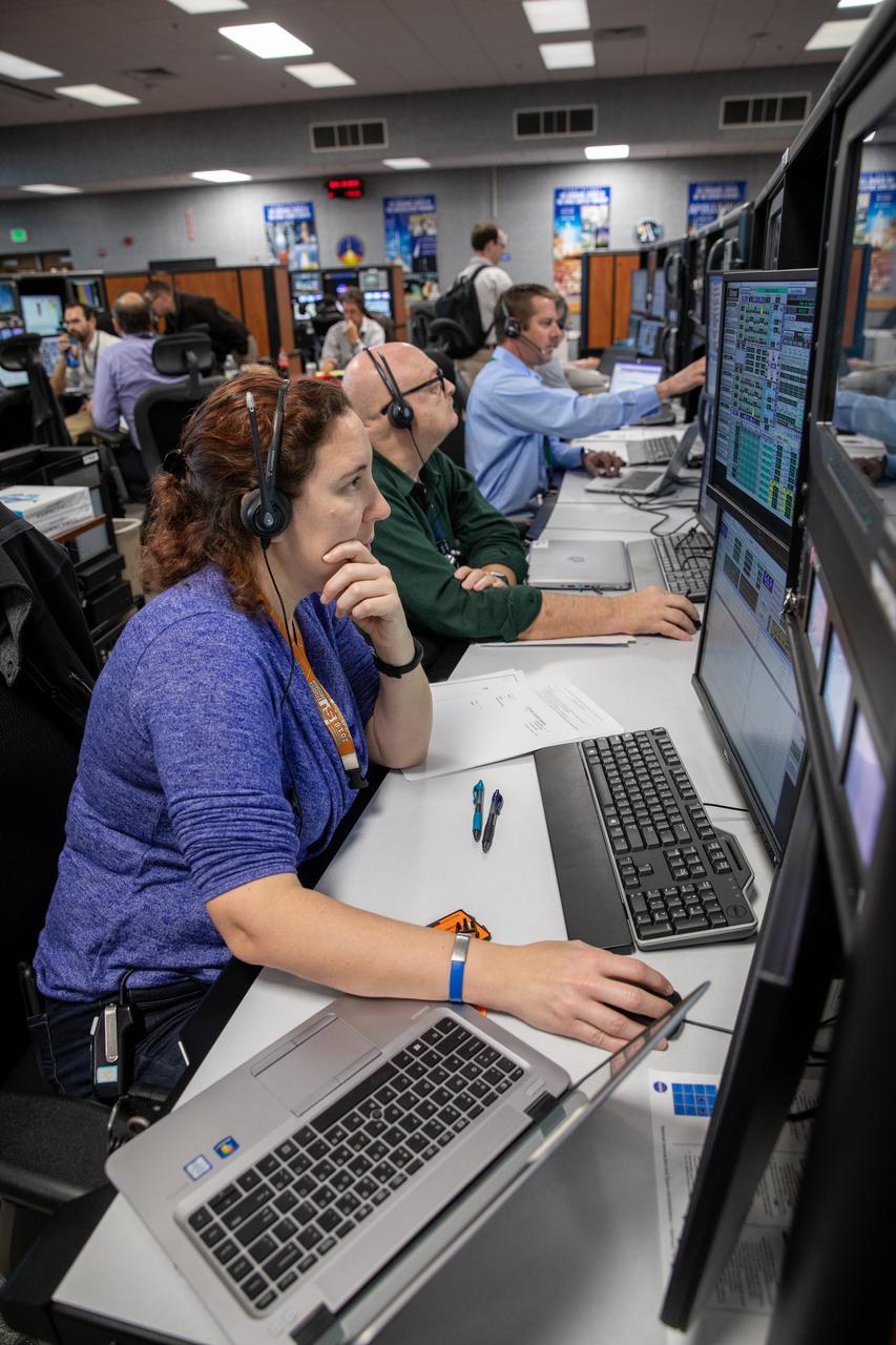 Members of the Artemis I launch team participate in a countdown simulation inside the Launch Control Center’s Firing Room 1.