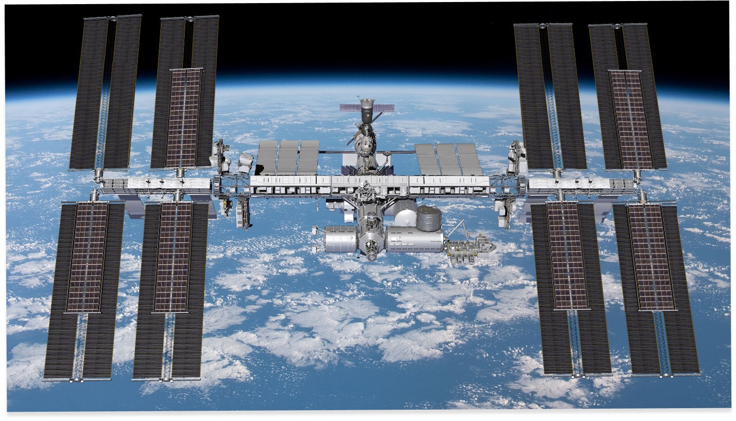 image of space station flying above Earth
