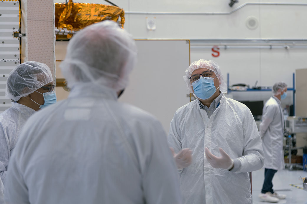 Project Manger Parage Vaze stands in the JPL clean room