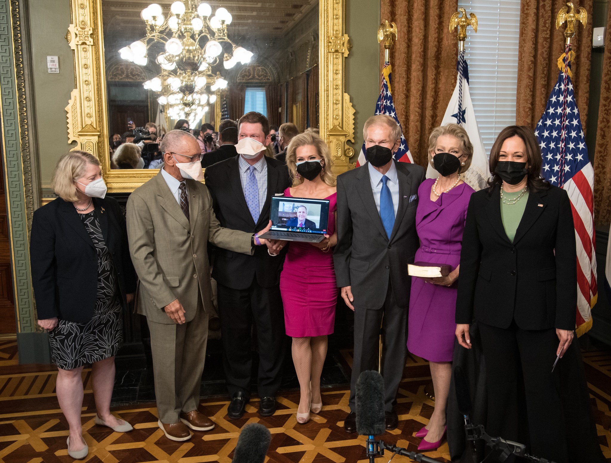 Vice President Kamala Harris and former Sen. Bill Nelson with others after Harris swore in Nelson as NASA's 14th administrator on May 3, 2021.