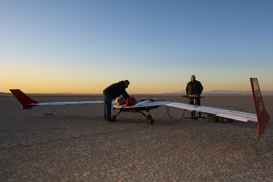 The X-56B remotely piloted aircraft ground crew prepares the aircraft 