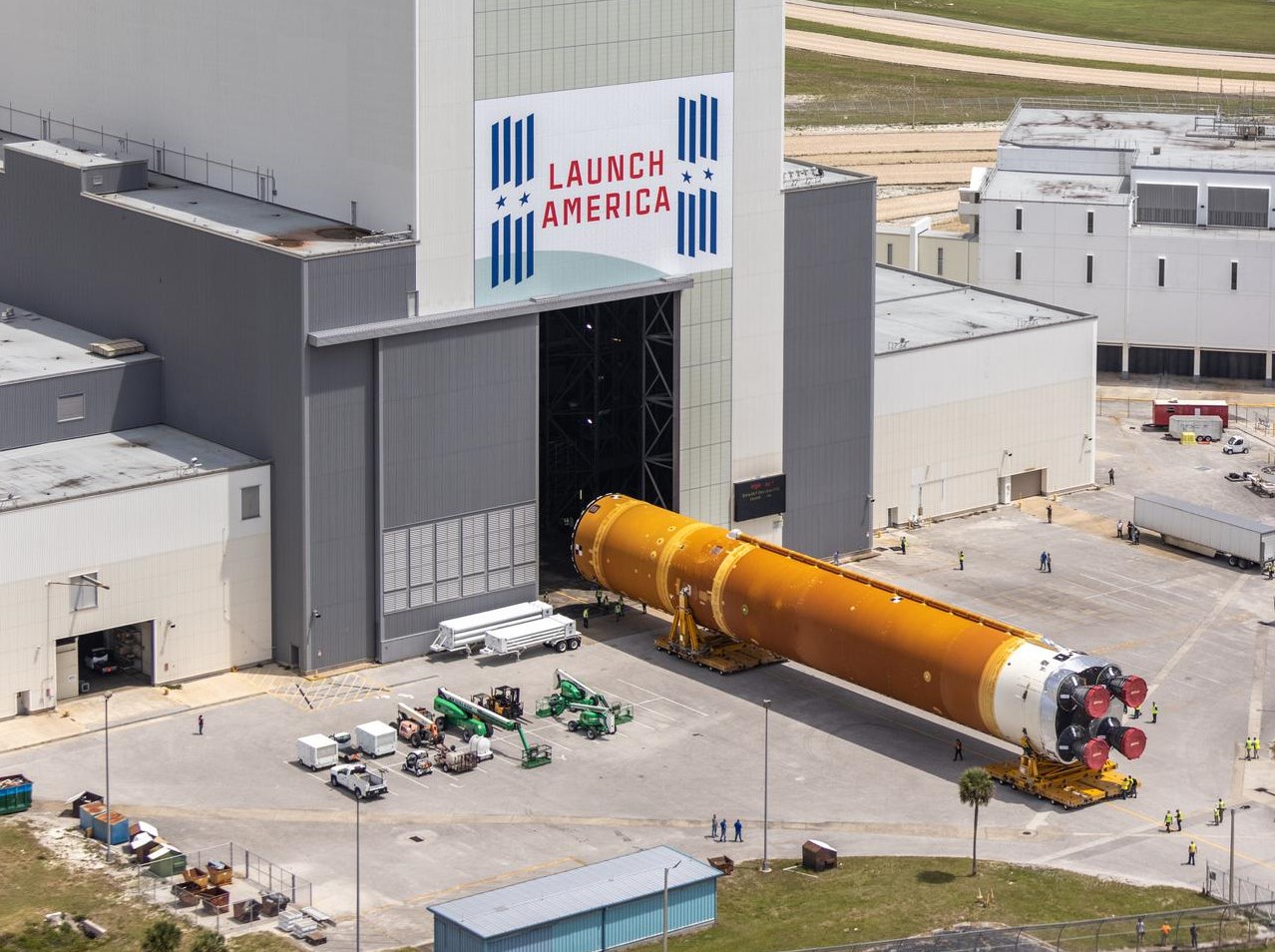 Crews guide the final piece of NASA’s Space Launch System rocket to the Vehicle Assembly Building at NASA’s Kennedy Space Center on April 29. 