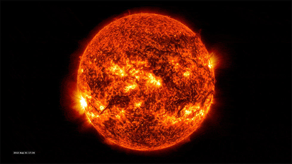 An extreme ultraviolet view of the Sun shows a tongue of solar material blasting off