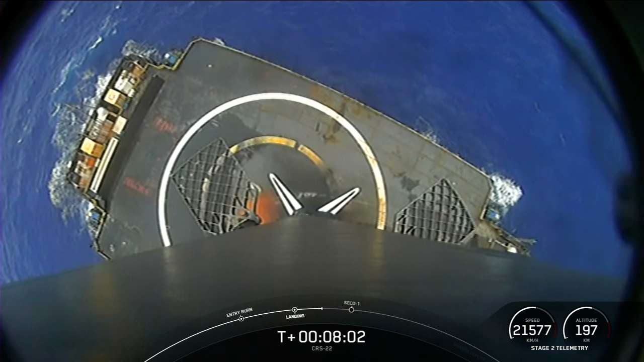 A SpaceX Falcon 9 rocket's first stage lands on a droneship in the Atlantic Ocean after launching SpaceX's 22nd commercial resupply services mission.