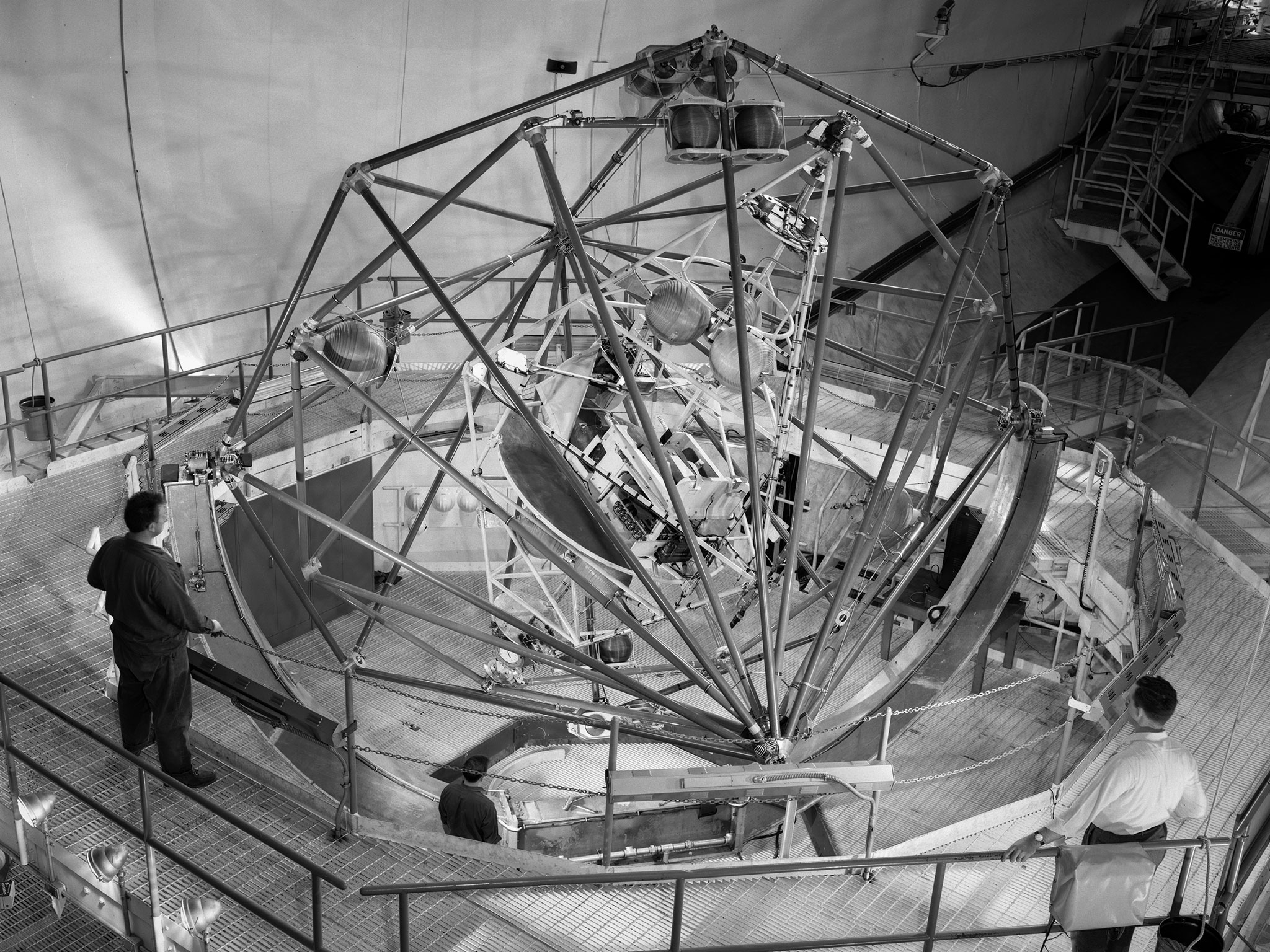 Black and white image of the the Multi Axis Spin Test Inertia Facility device for astronaut training.