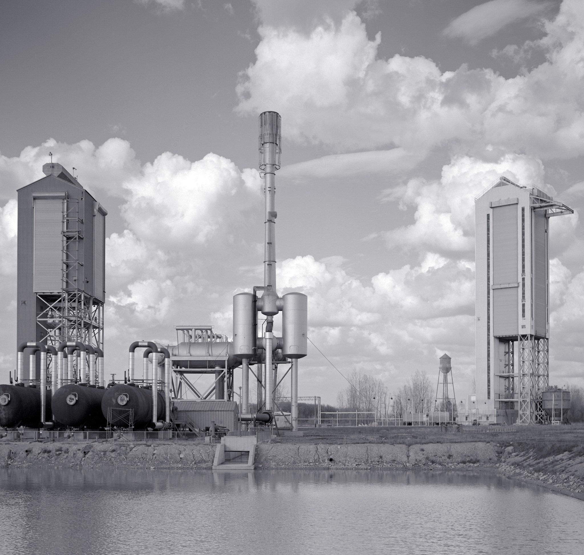 Black and white image of silos and water tanks at Lewis Research Center.