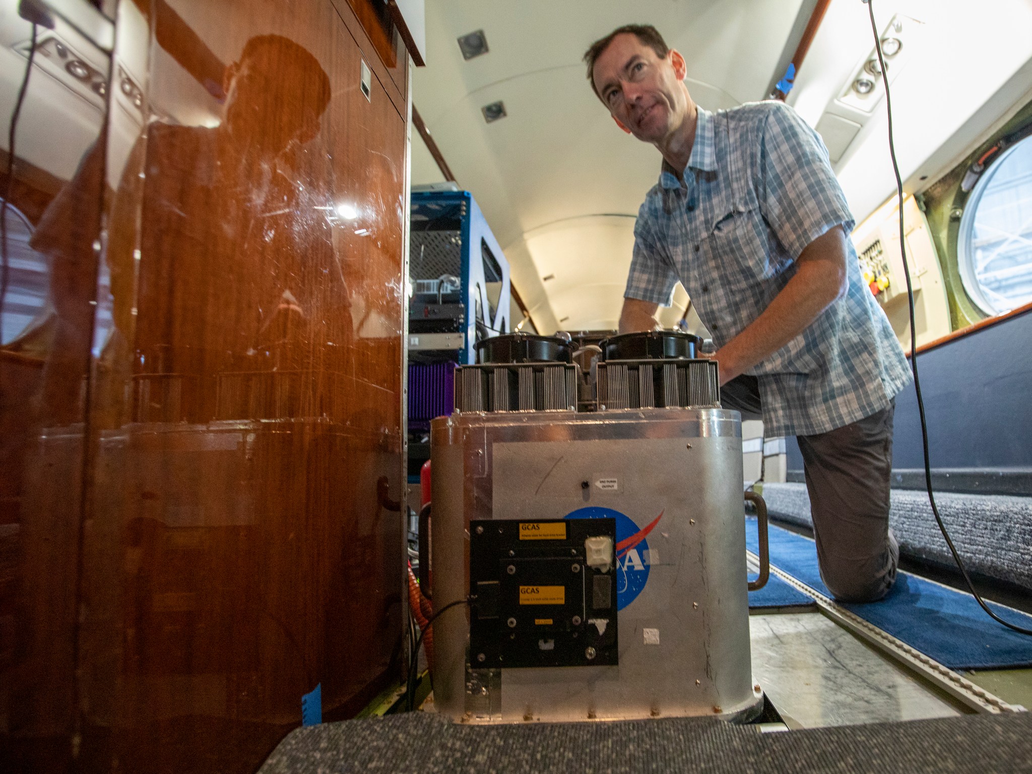 Matt Kowalewski integrates the GEOstationary Coastal and Air Pollution Events (GEO-CAPE) Airborne Simulator (GCAS) instrument onto Langley's C-20B Gulfstream III aircraft ahead of MOOSE.