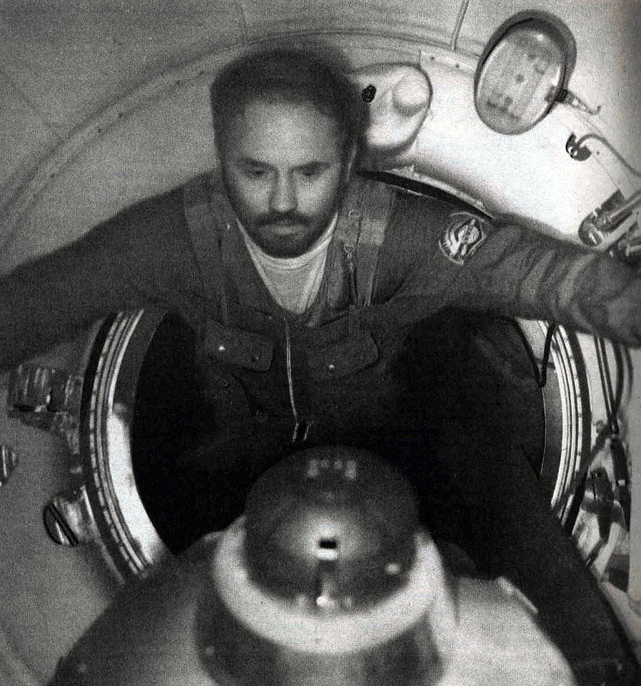 soyuz_11_crew_17_onboard_dobrovolski_reentering_soyuz_from_salyut_during_packing_for_return