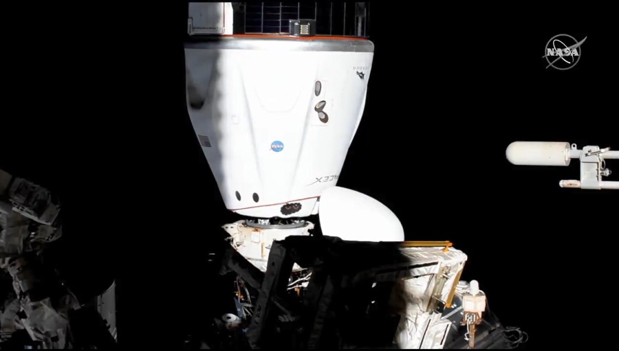 The SpaceX Crew-2 Dragon is pictured after maneuvering to the Harmony module's space-facing international docking adapter.