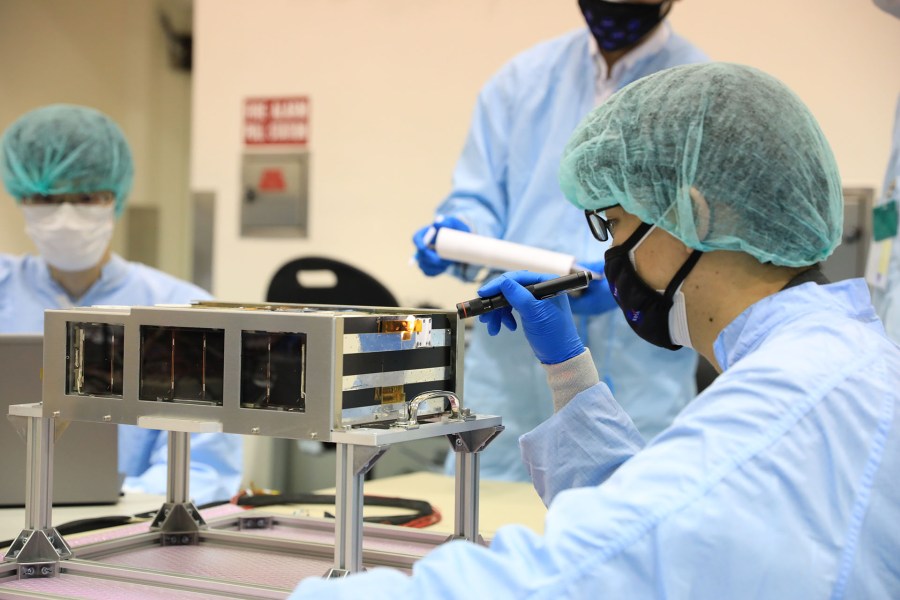 Members of the EQUULEUS (EQUilibriUm Lunar-Earth point 6U Spacecraft) team