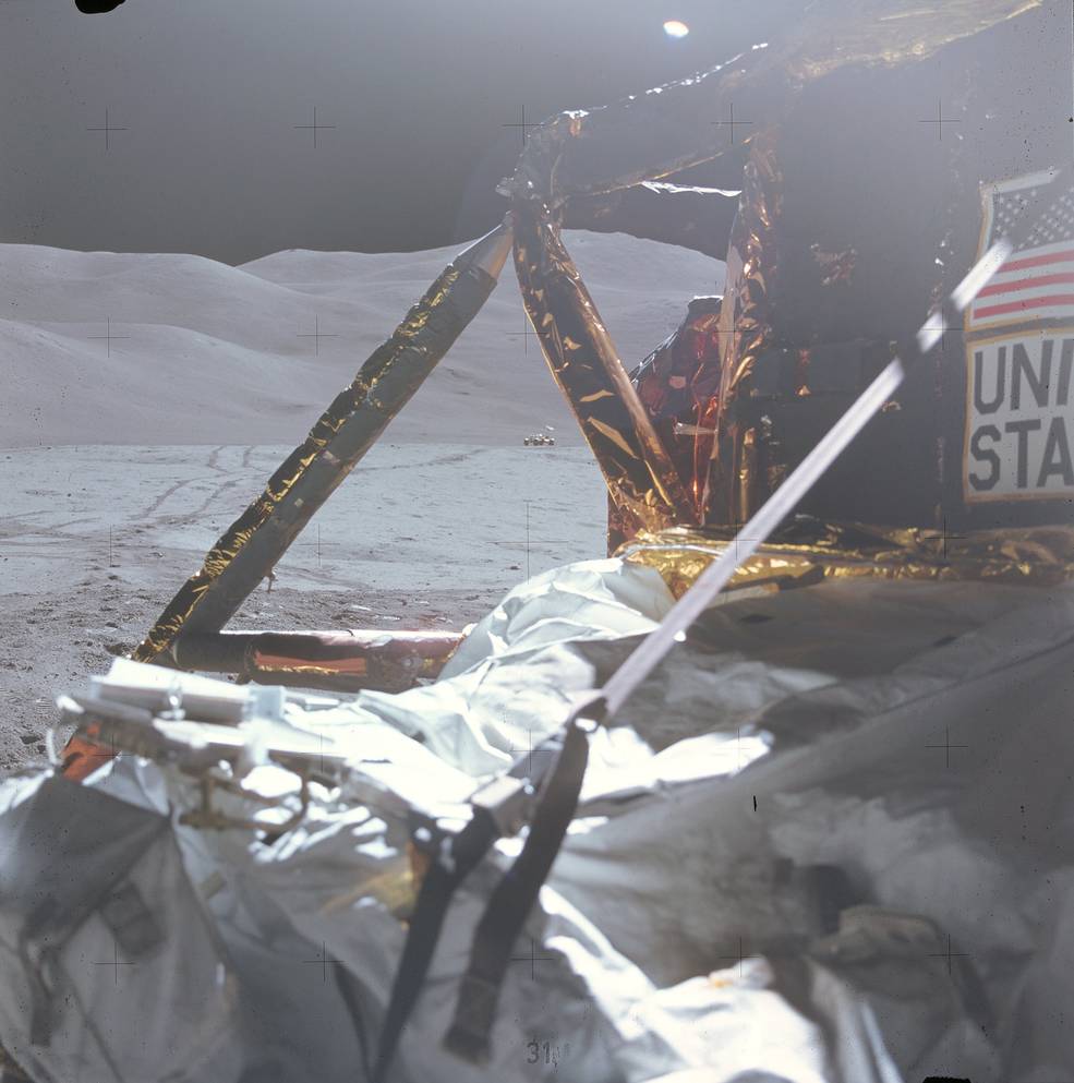 apollo_15_moon_landing_34_eva3_final_surface_photo_lm_and_rover_in_distance