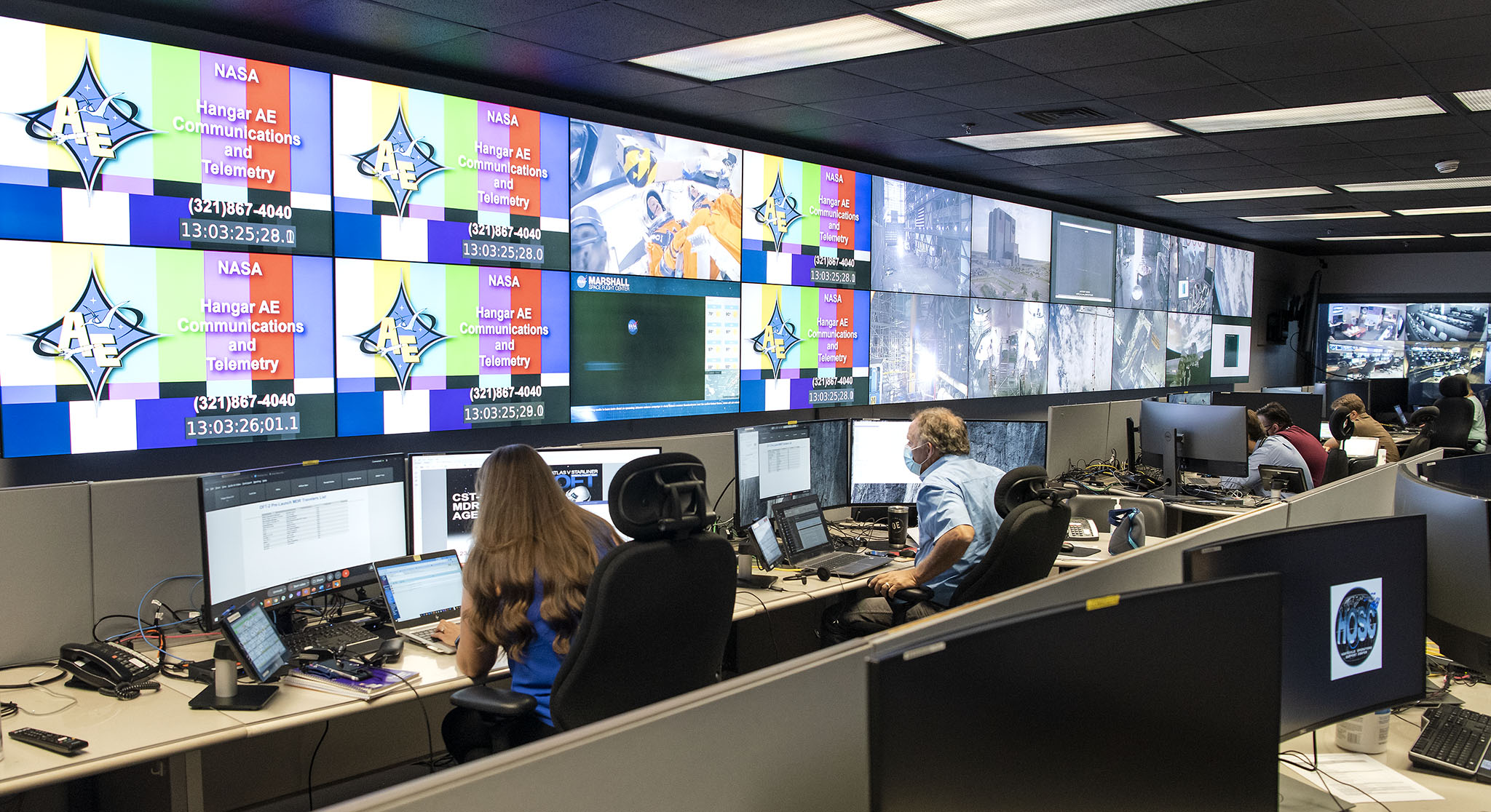 Members of the Commercial Crew Program team at Marshall take part in a Boeing OFT-2 launch simulation July 23 at the Huntsville Operations Support Center. 