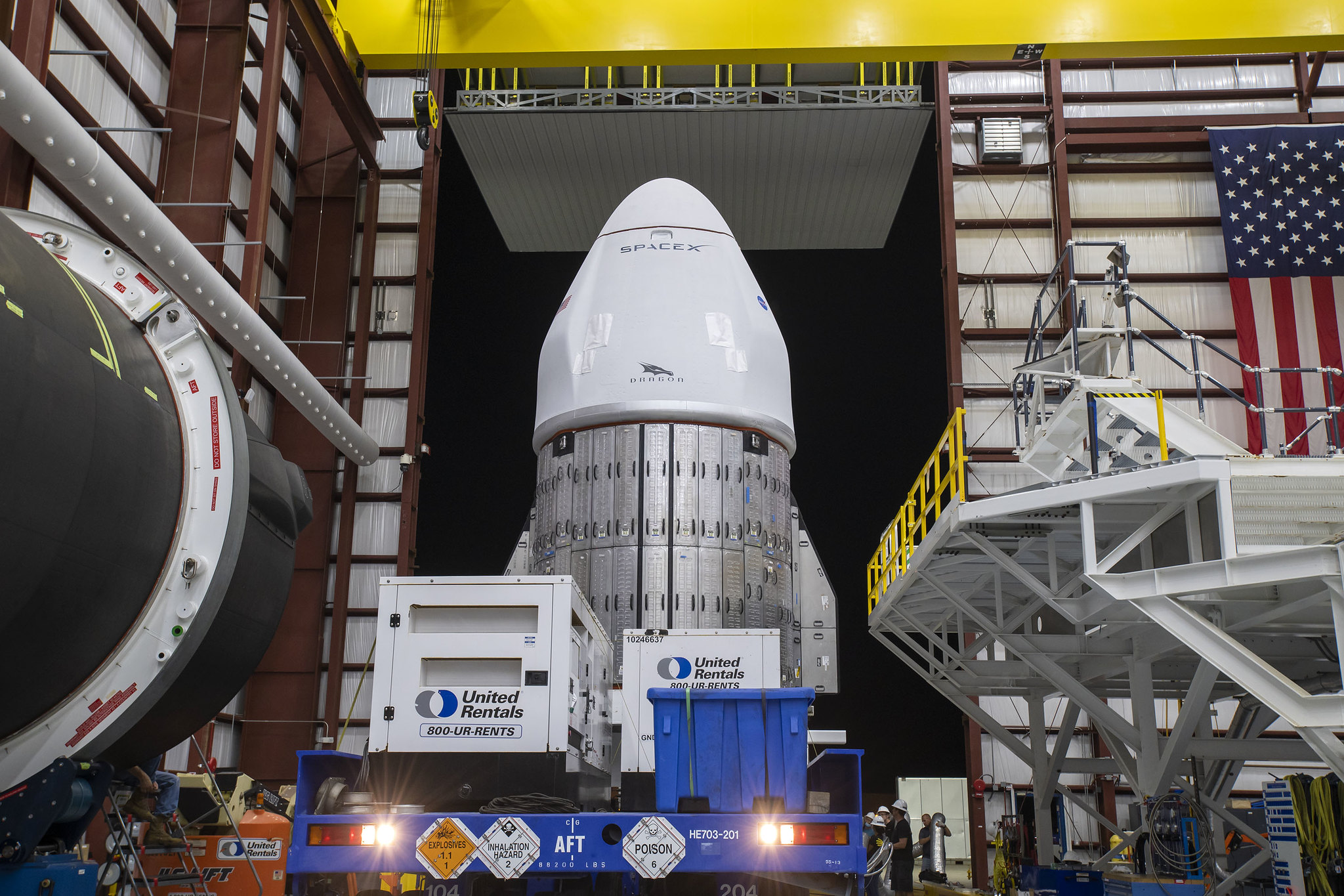 The SpaceX Dragon spacecraft resting in the hangar at NASA’s Kennedy Space Center’s Launch Complex.