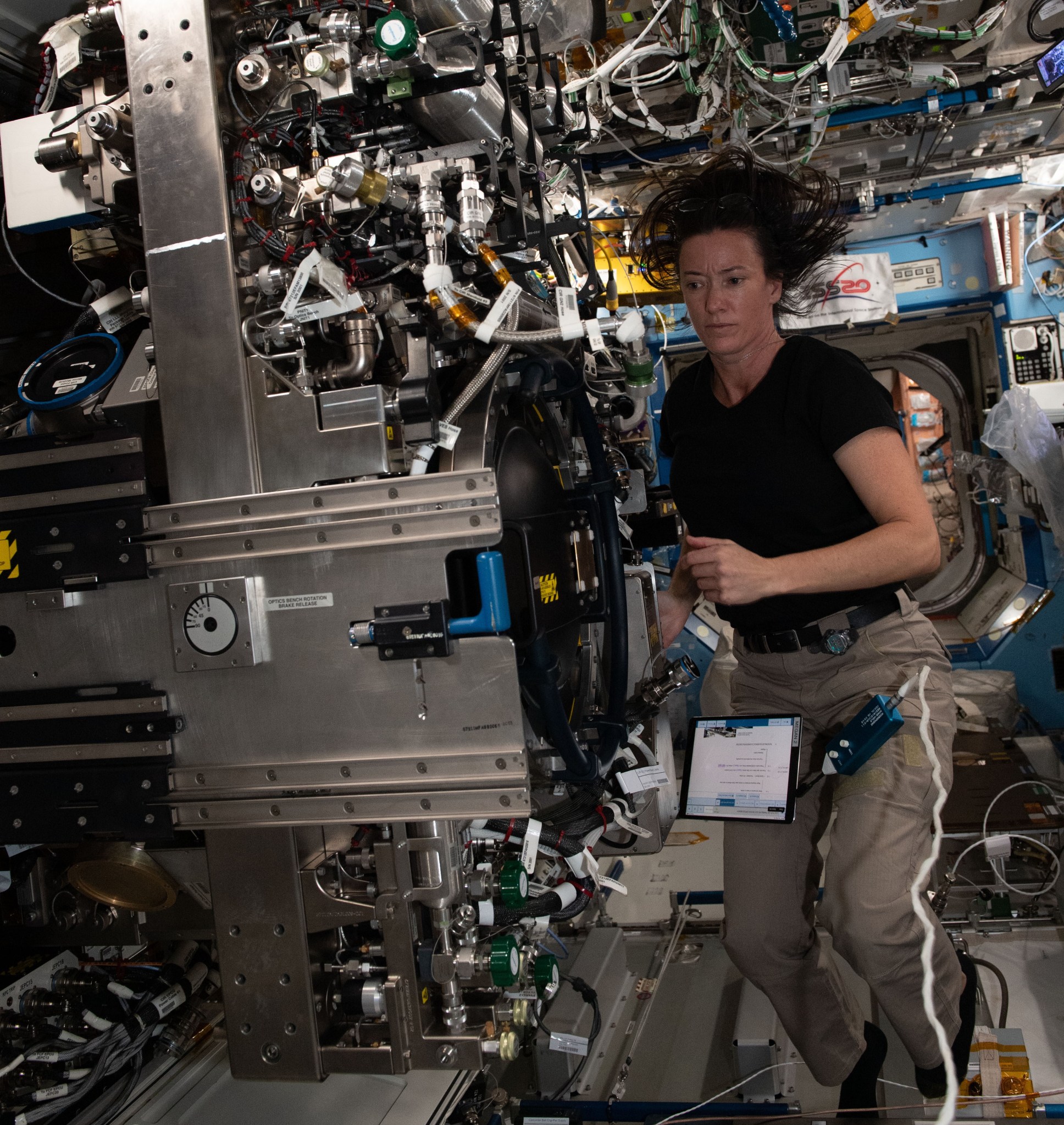 Image of astronaut Megan McArthur working with experiment.