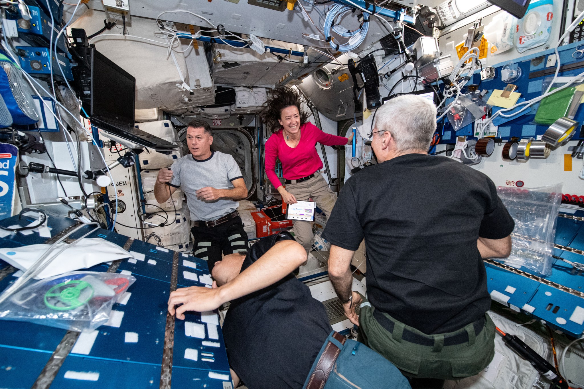 Expedition 65 astronauts (clockwise from left) Shane Kimbrough, Megan McArthur, Mark Vande Hei and Akihiko Hoshide are pictured inside the International Space Station's Harmony module.