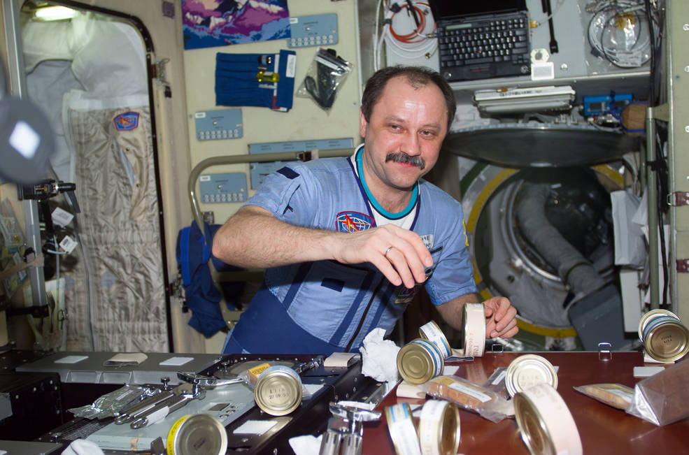 iss20_sts_104_17_usachev_preparing_meal_in_zvezda