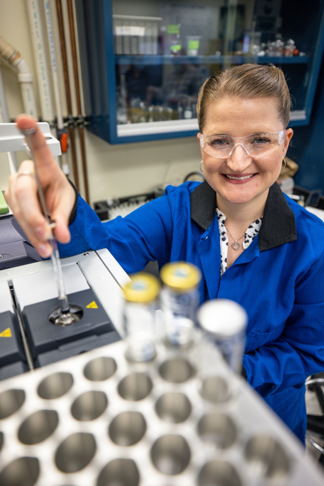 Senior analytical chemist Janelle Coutts injects a sample for gas chromatography-mass spectrometry analysis inside NASA Engineering’s Analytical Laboratories at Kennedy Space Center in Florida on July 7, 2021. 