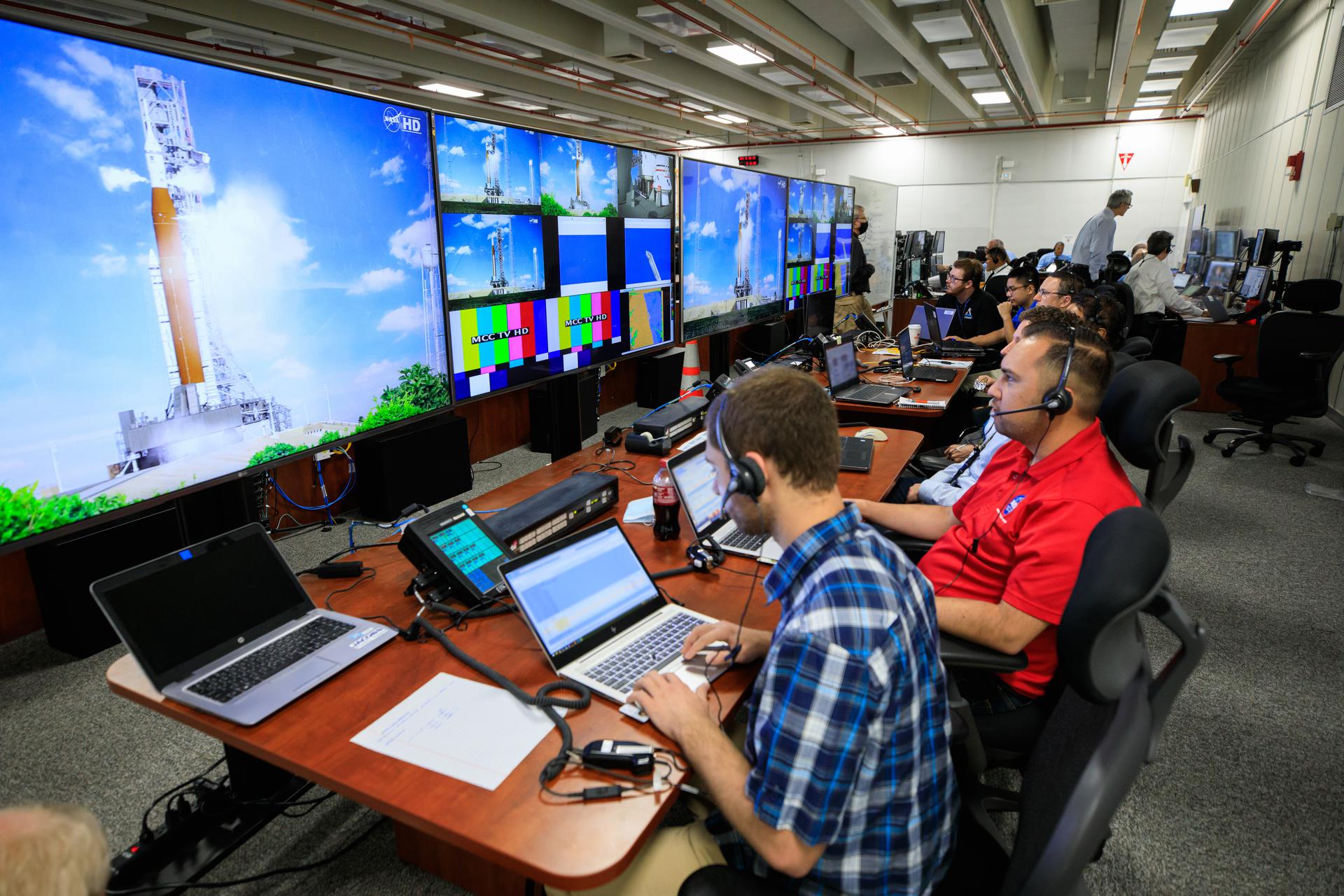 Teams participate in the first joint integrated launch countdown for Artemis I inside the Launch Control Center at Kennedy Space Center.
